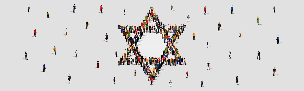 A group of people standing to make the star of David.