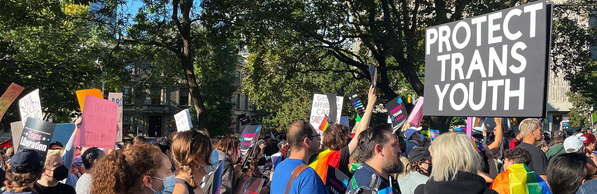 A group of people protesting for Trans youth rights