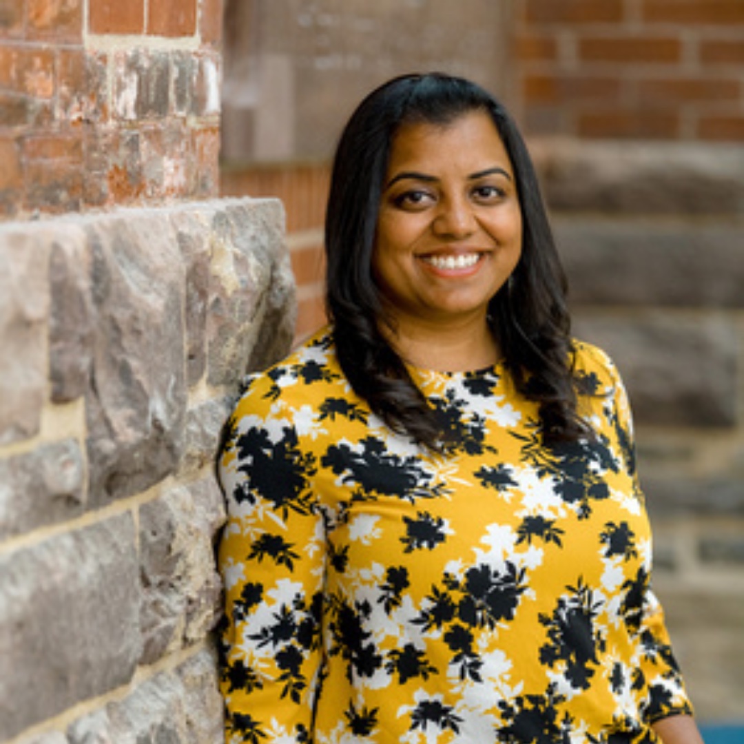 A headshot of Anita Abraham, Director, Experiential Learning.