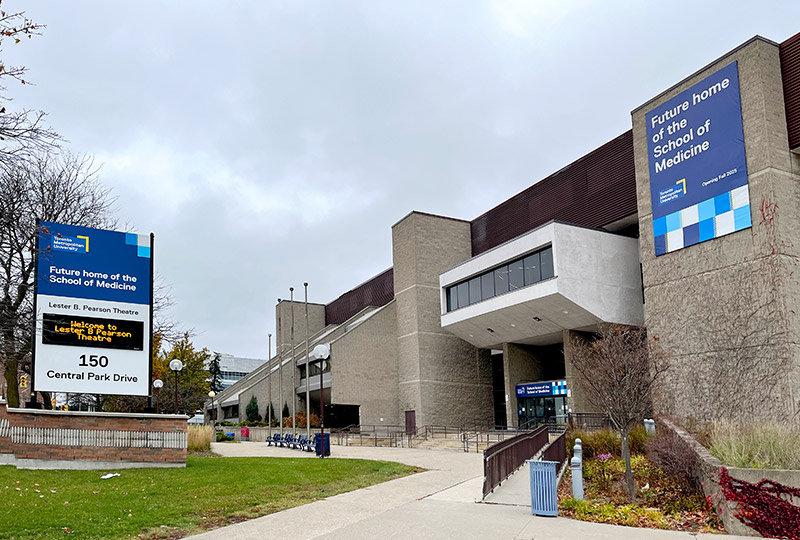 The School of Medicine's building with TMU signage and pre-exterior renovations