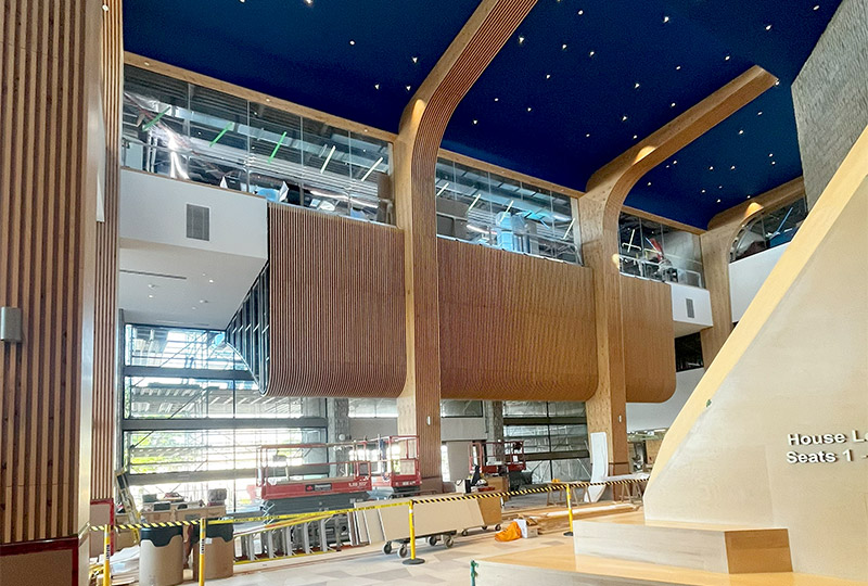 Vaulted ceilings with wood buttresses add some organic curvilinear visuals to the new space.