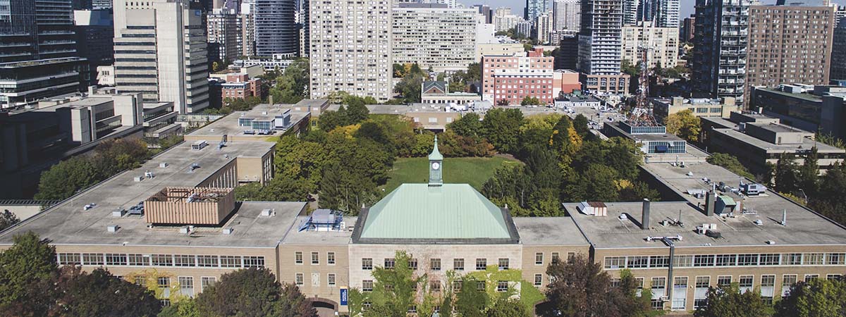 Aerial view of Kerr Hall, with the greenery of the Ryerson Quad in the centre.