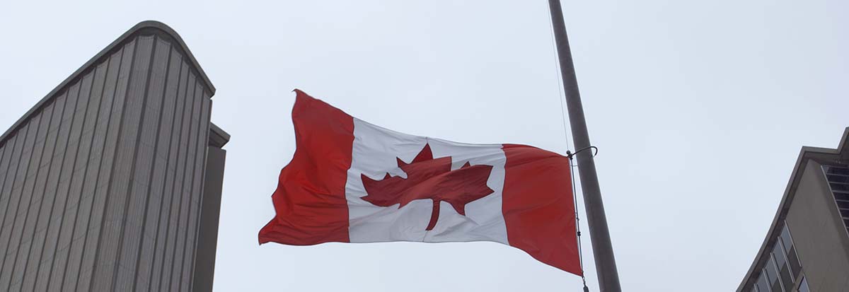 Canadian flag at half mast at Toronto City Hall
