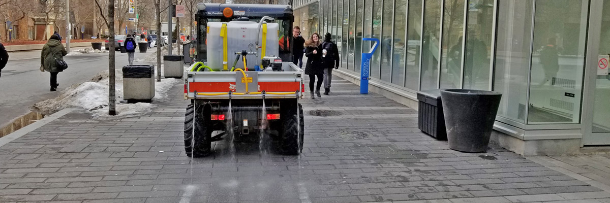 A saline solution being applied to the street instead of road salt along Gould Street.