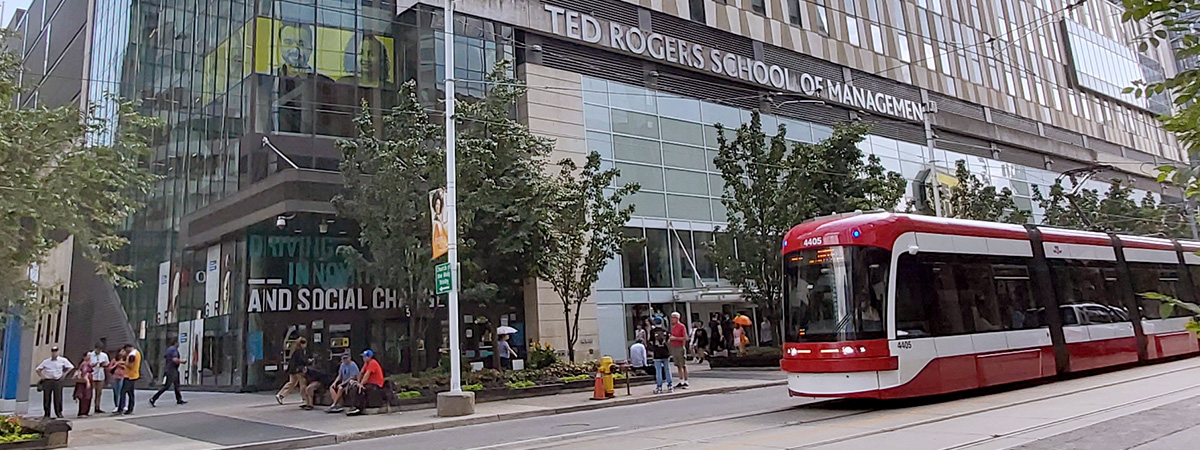A streetcar passes by TMU's Ted Rogers School of Management