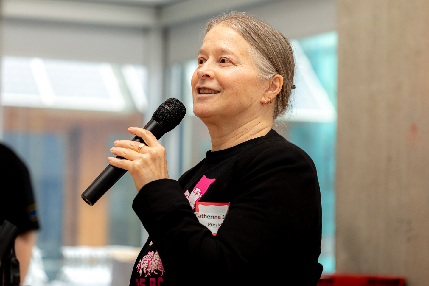 Catherine Jenkins art the 2025 CUPE rally speaking into a microphone