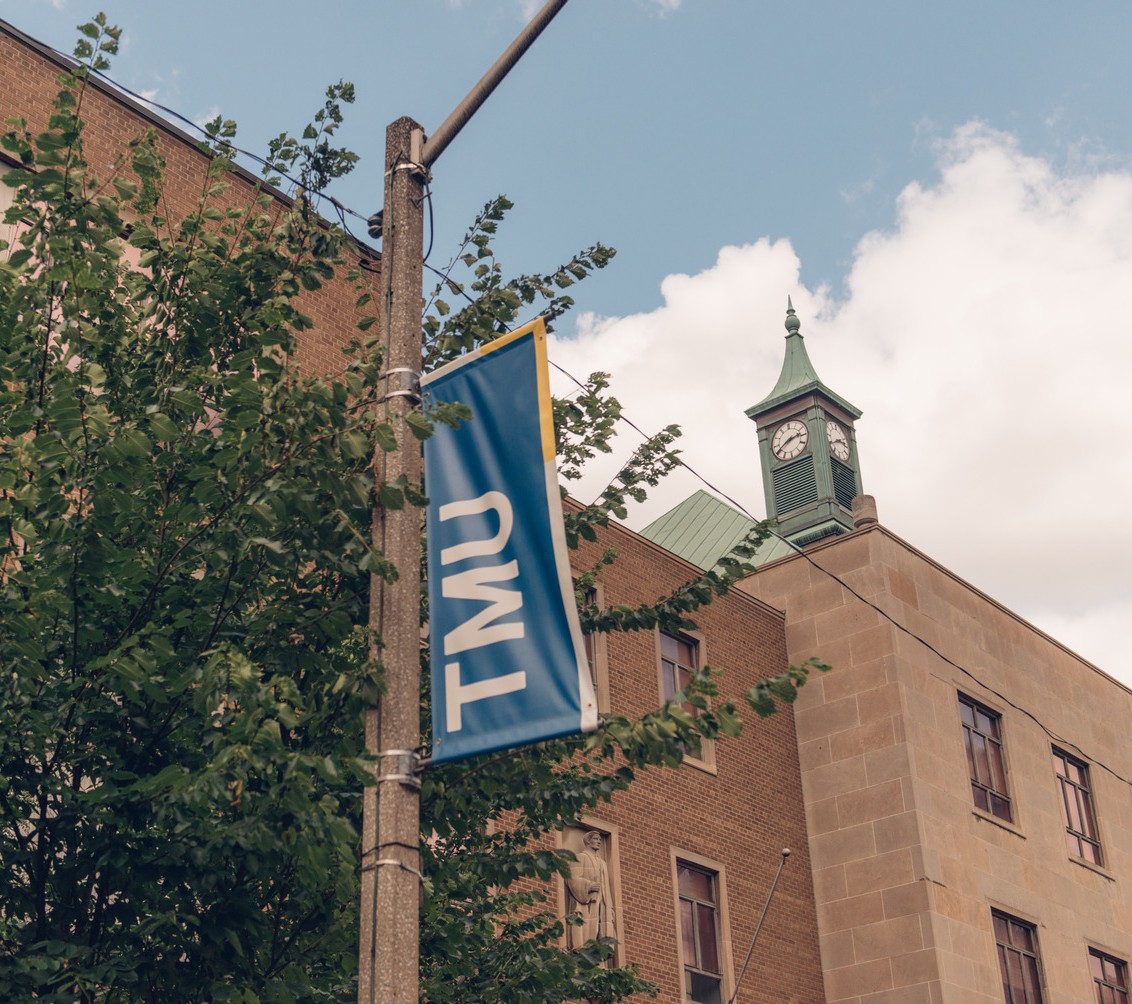 TMU flag on campus