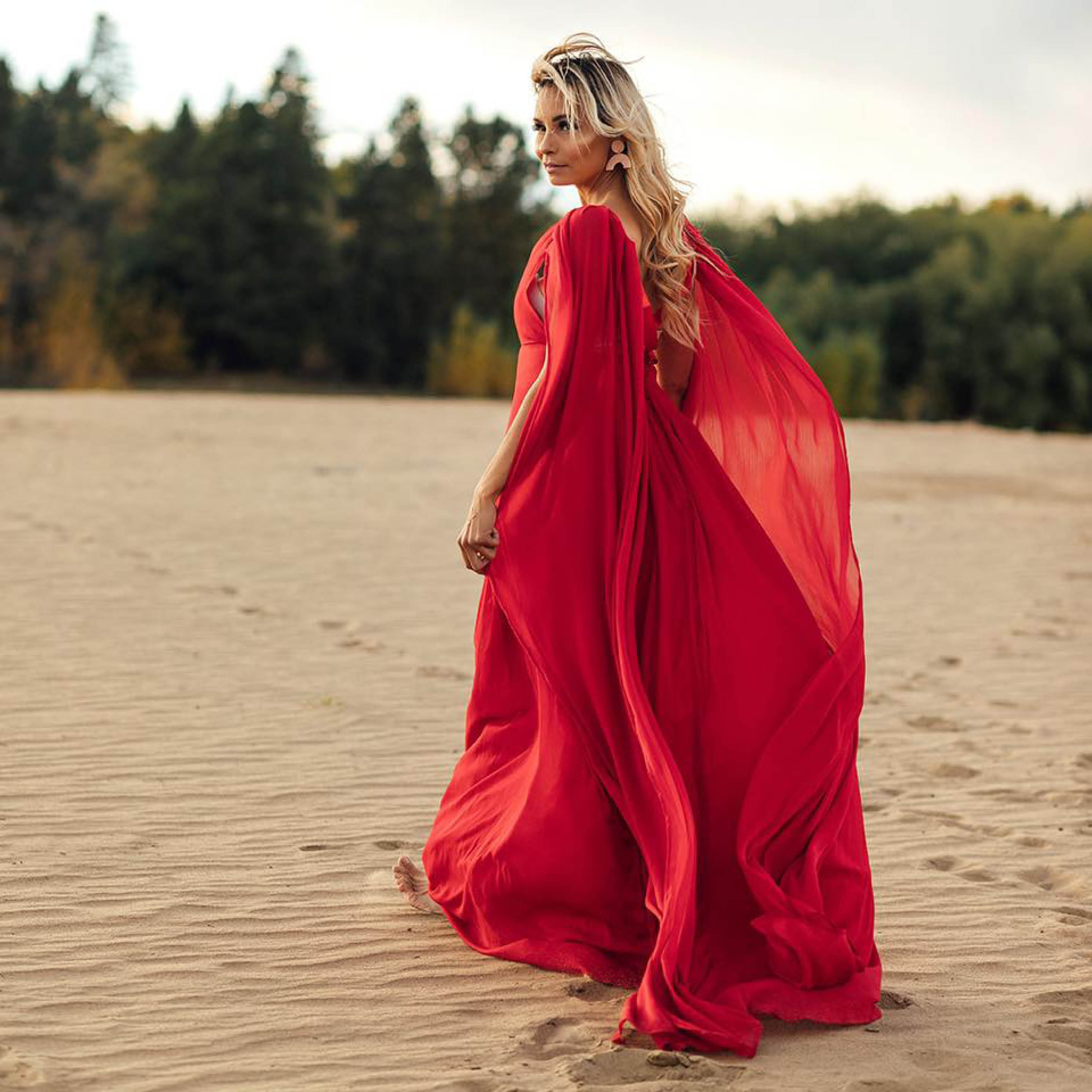 Heather Bouchier Designs red dress in the desert.