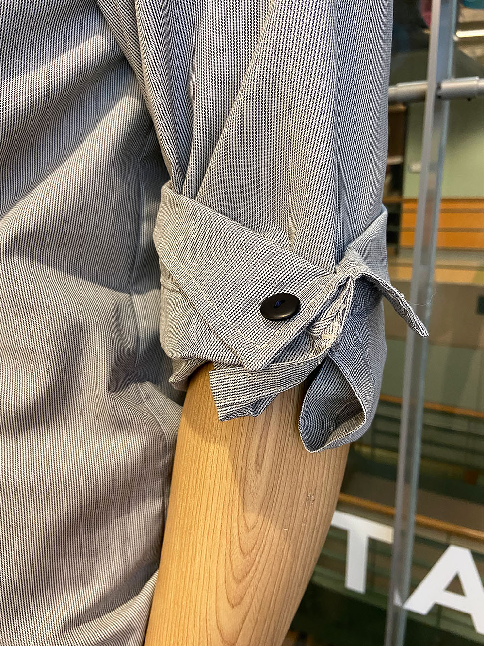 Close up of sleeve detailing on a 1930s replica of a prison uniform 