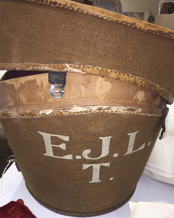 The top hat box with the initials E.J.L.T.