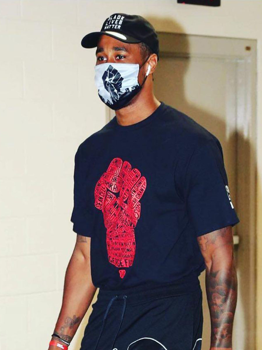 Toronto Raptors player wearing Nadia Lloyd's Black Lives Matter face mask. 