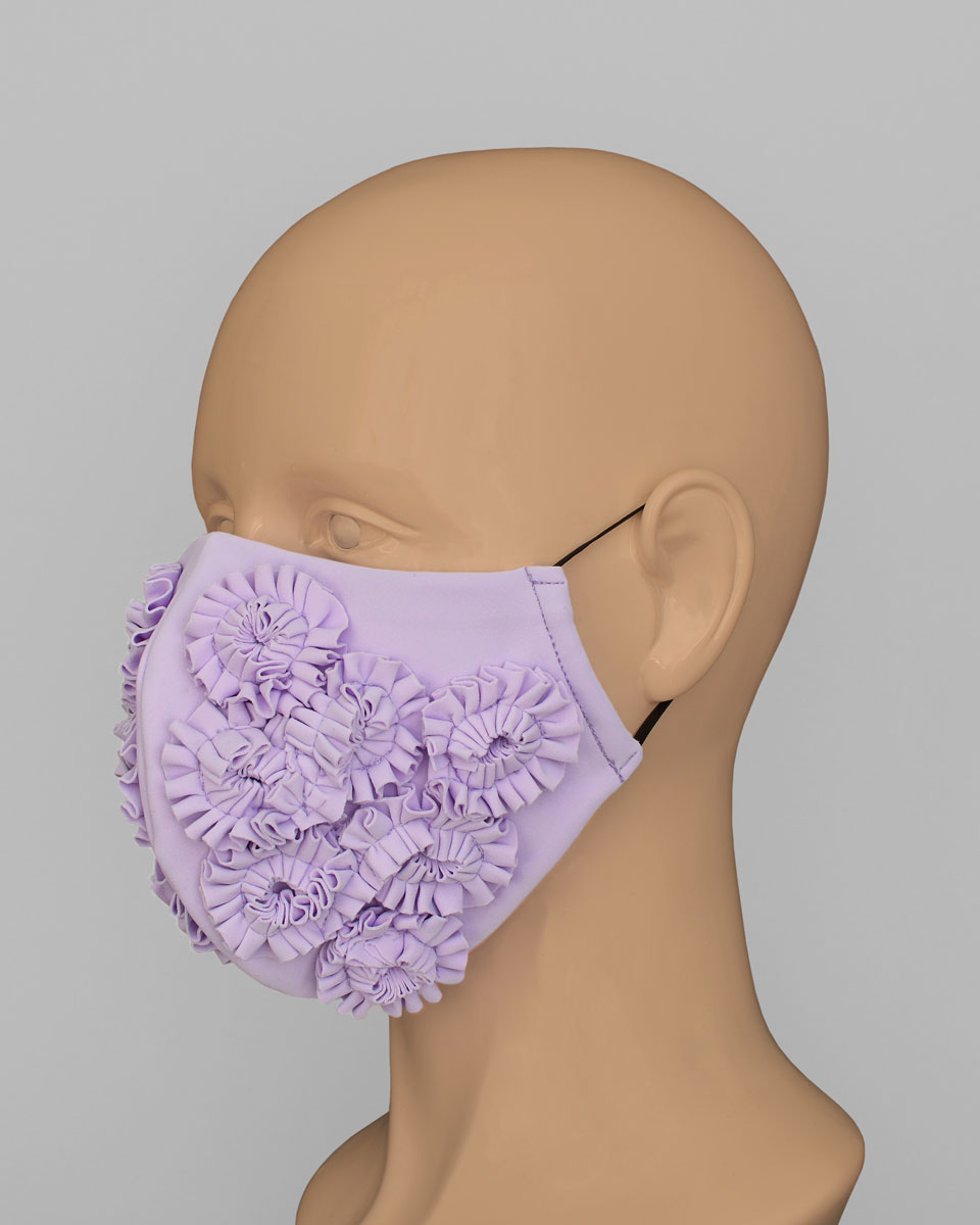 Side view of the purple mask showing the ruffles