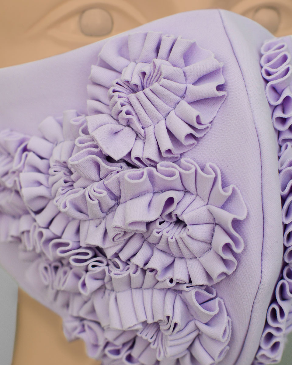 Close up of the ruffles on the mask