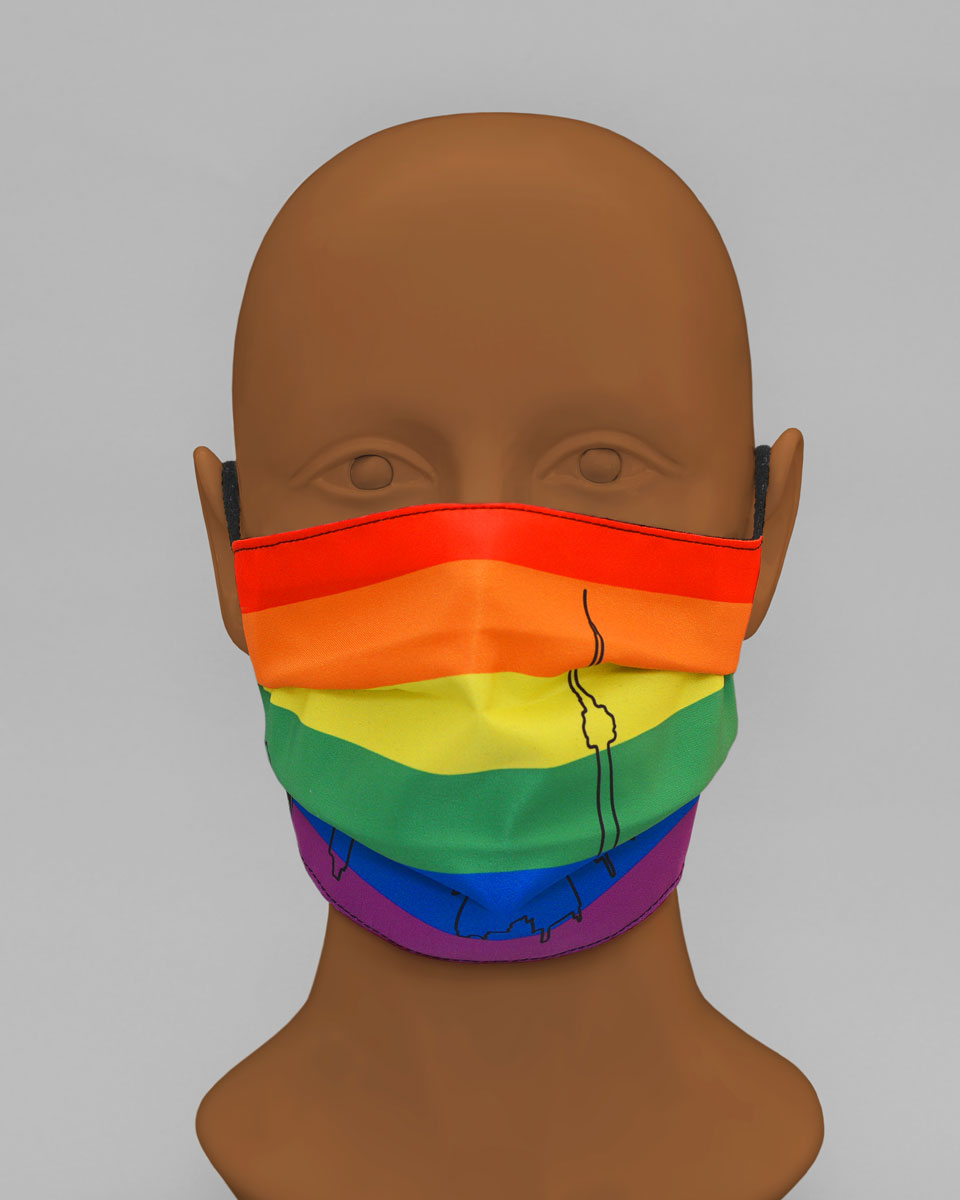 Mannequin head wearing a rainbow pride face mask with an outline of the Toronto skyline