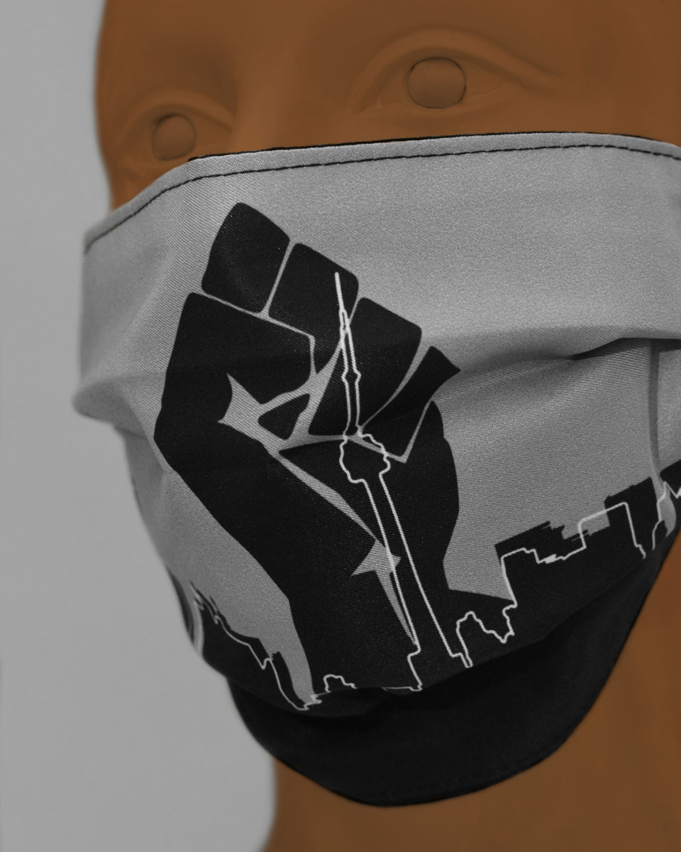 Close up of the illustration of the fist and Toronto skyline