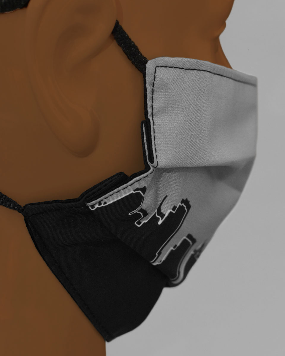 The pleats on the side of the face mask