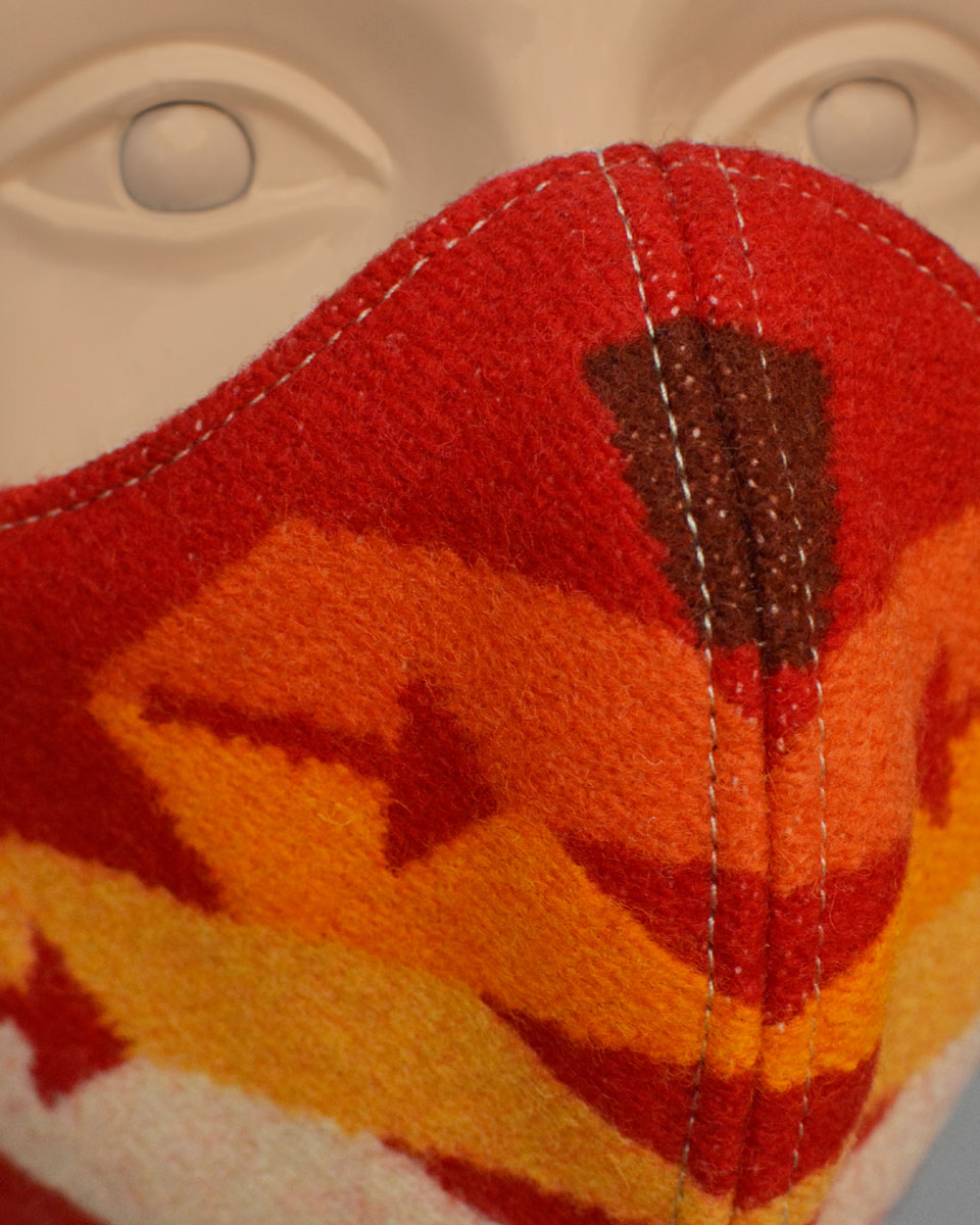 Detail shot of the stitching on the red split shot mask