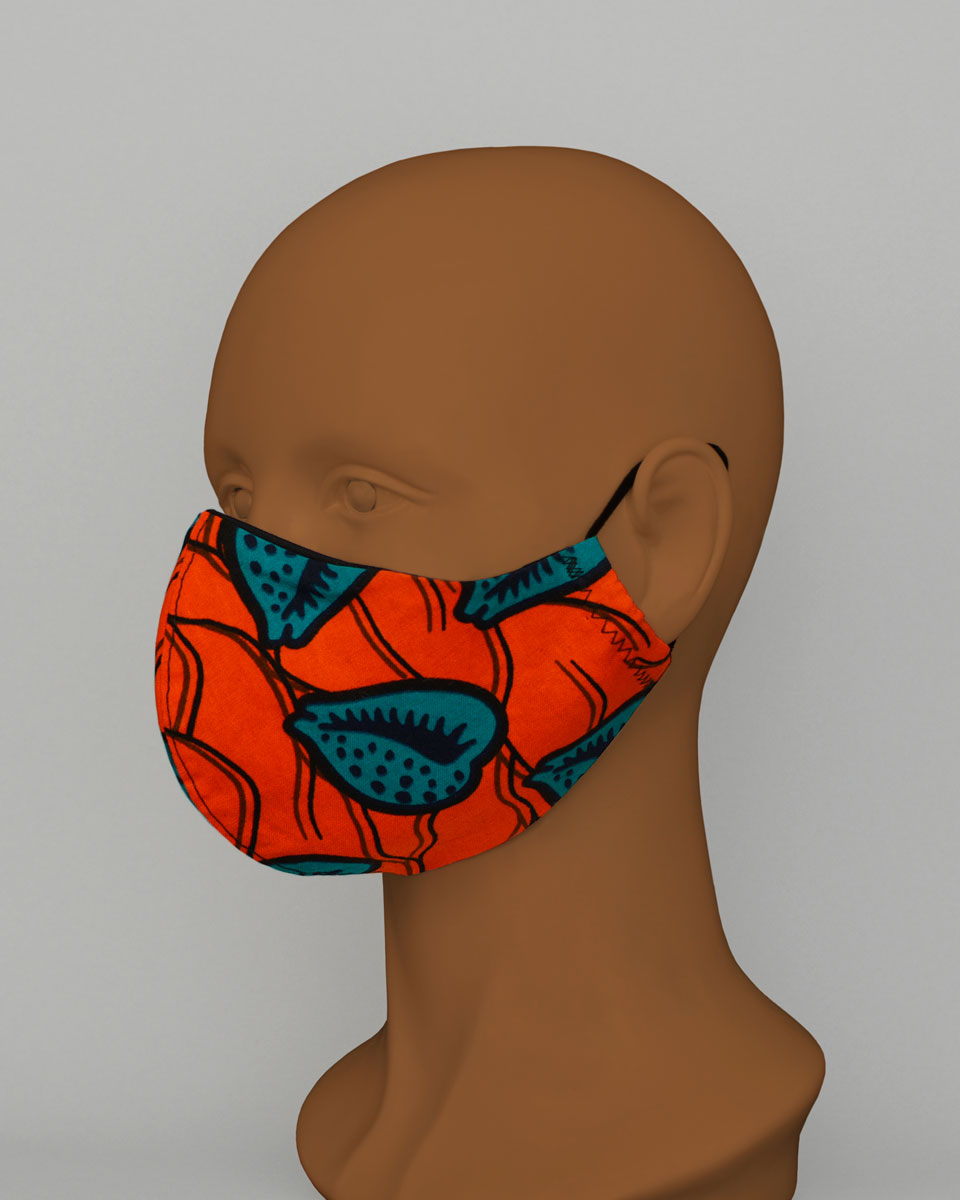 Side view of the orange and blue patterned face mask