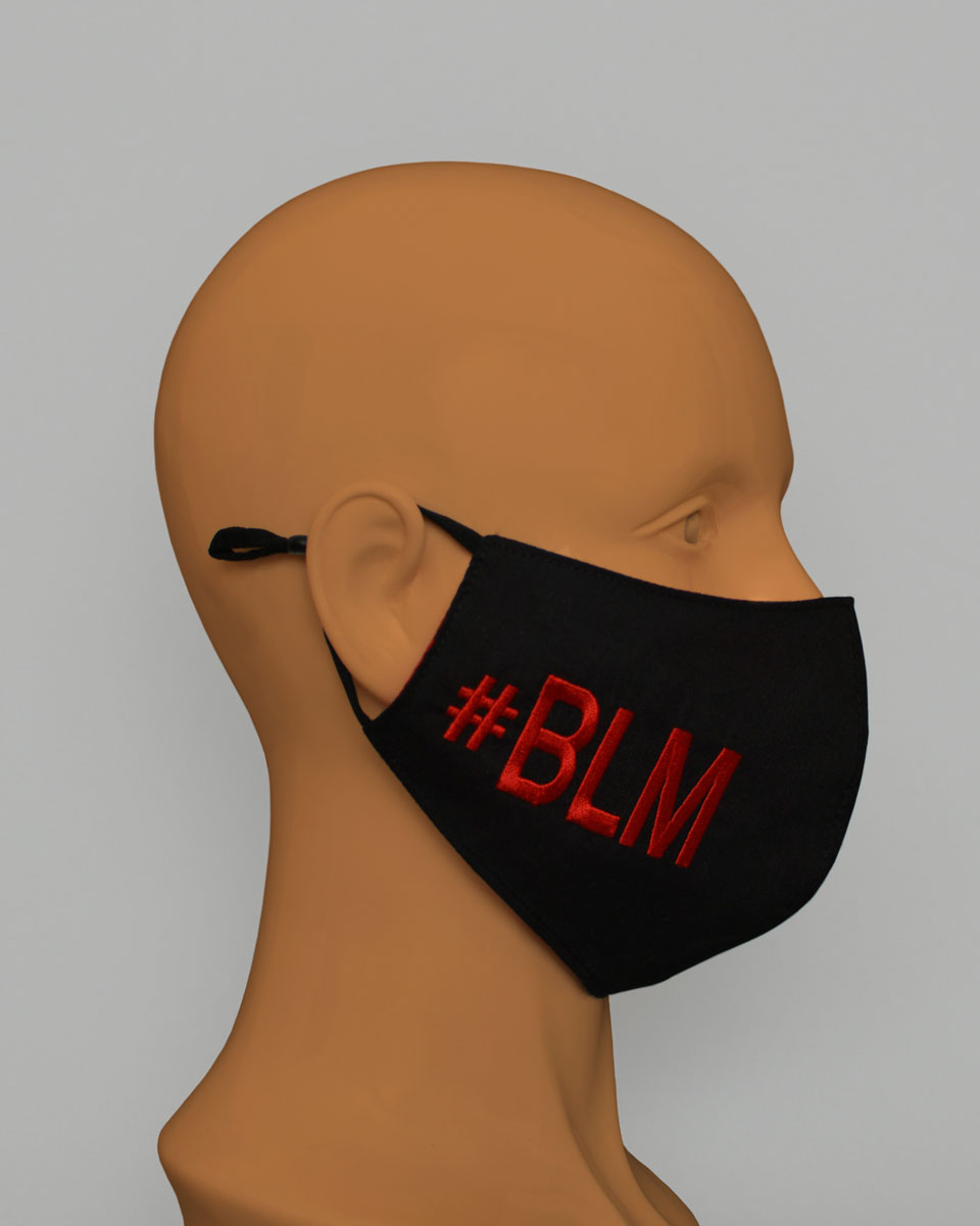 Side view of a mannequin head wearing. black face mask with #BLM embroidered in red.