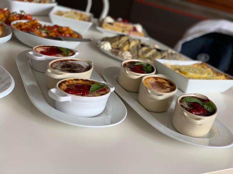 Fancy deserts laid out on table