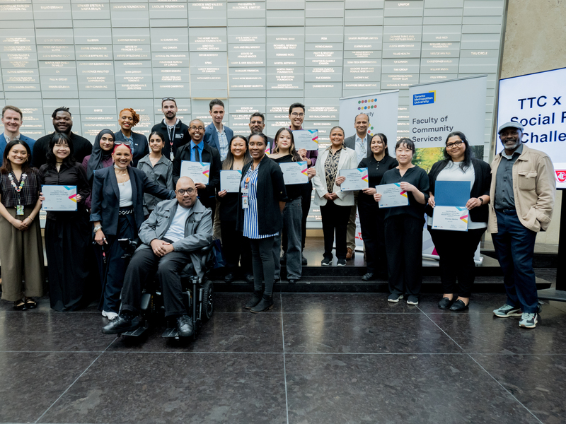 Participants, faculty, staff and TTC reps posing for a large group shot