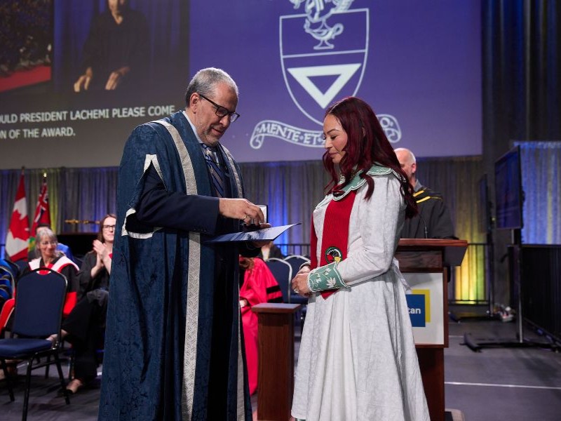 Brittany Johnson on stage recieving award