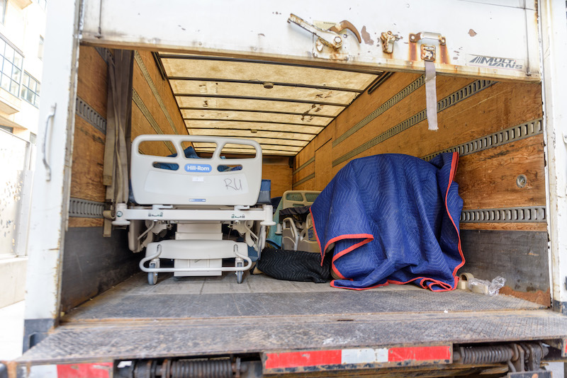 Hospital beds in truck ready to be donated.