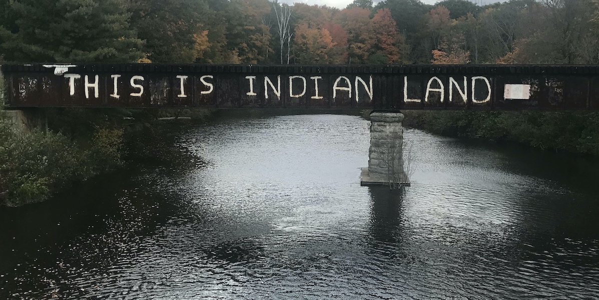 This is Indian land scribbled on a bridge