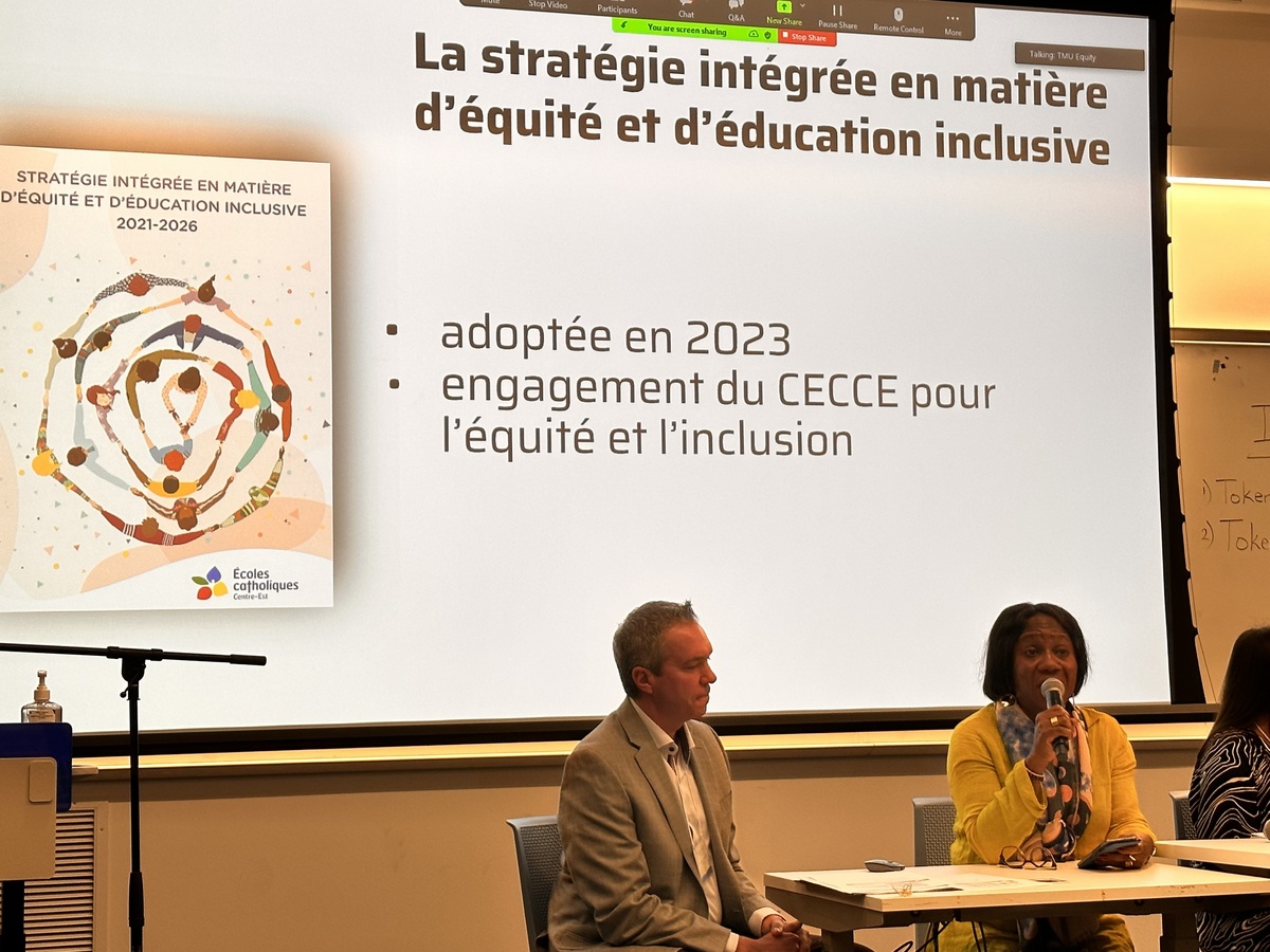A male and female panel speak in french at the Enhancing Equity in Ontario Elementary Education Symposium