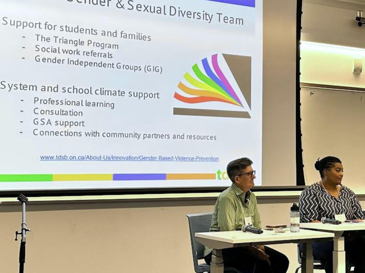 Two female panellists listen on at the Enhancing Equity in Ontario Elementary Education Symposium