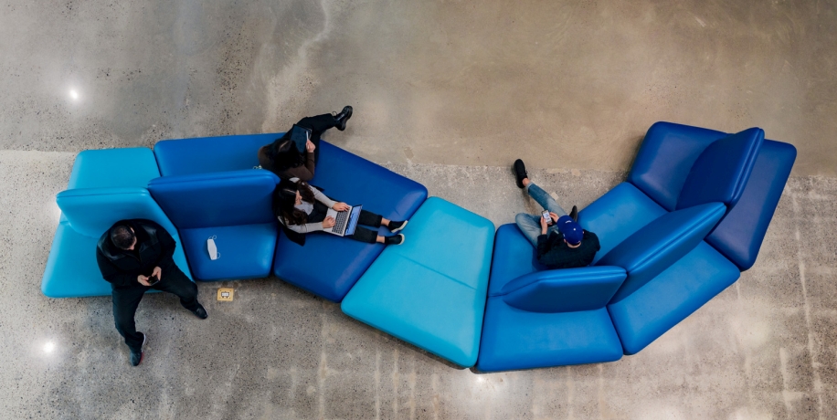 Rows of framed certificates for various student awards. 