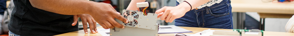 decorative students working on a robot