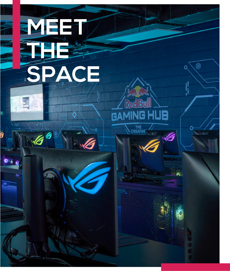 Meet the Space. Colourful gaming displays sitting on desks front of The Red Bull Gaming Hub logo.
