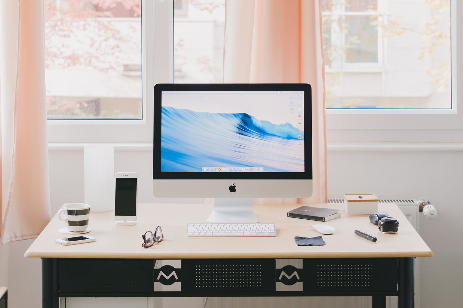 A computer on a desk.