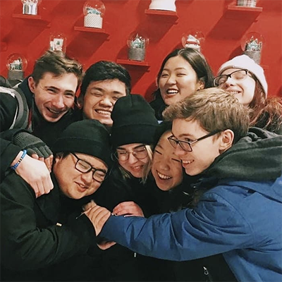 A group of students hugging