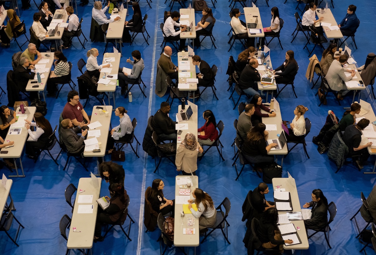 Photo of students and employers at GCM Career Fair