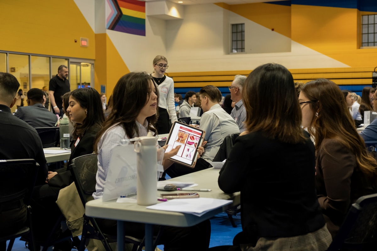 Photo of students and employers at GCM Career Fair