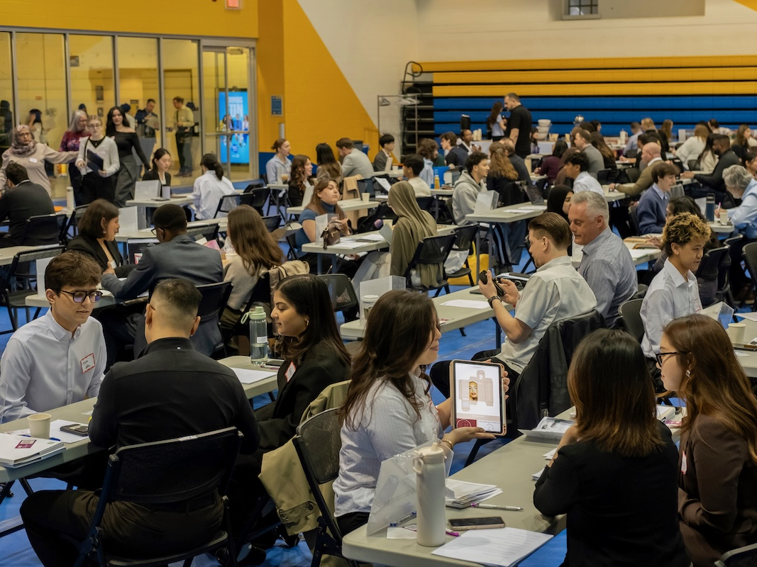 Photo of students and employers at GCM Career Fair
