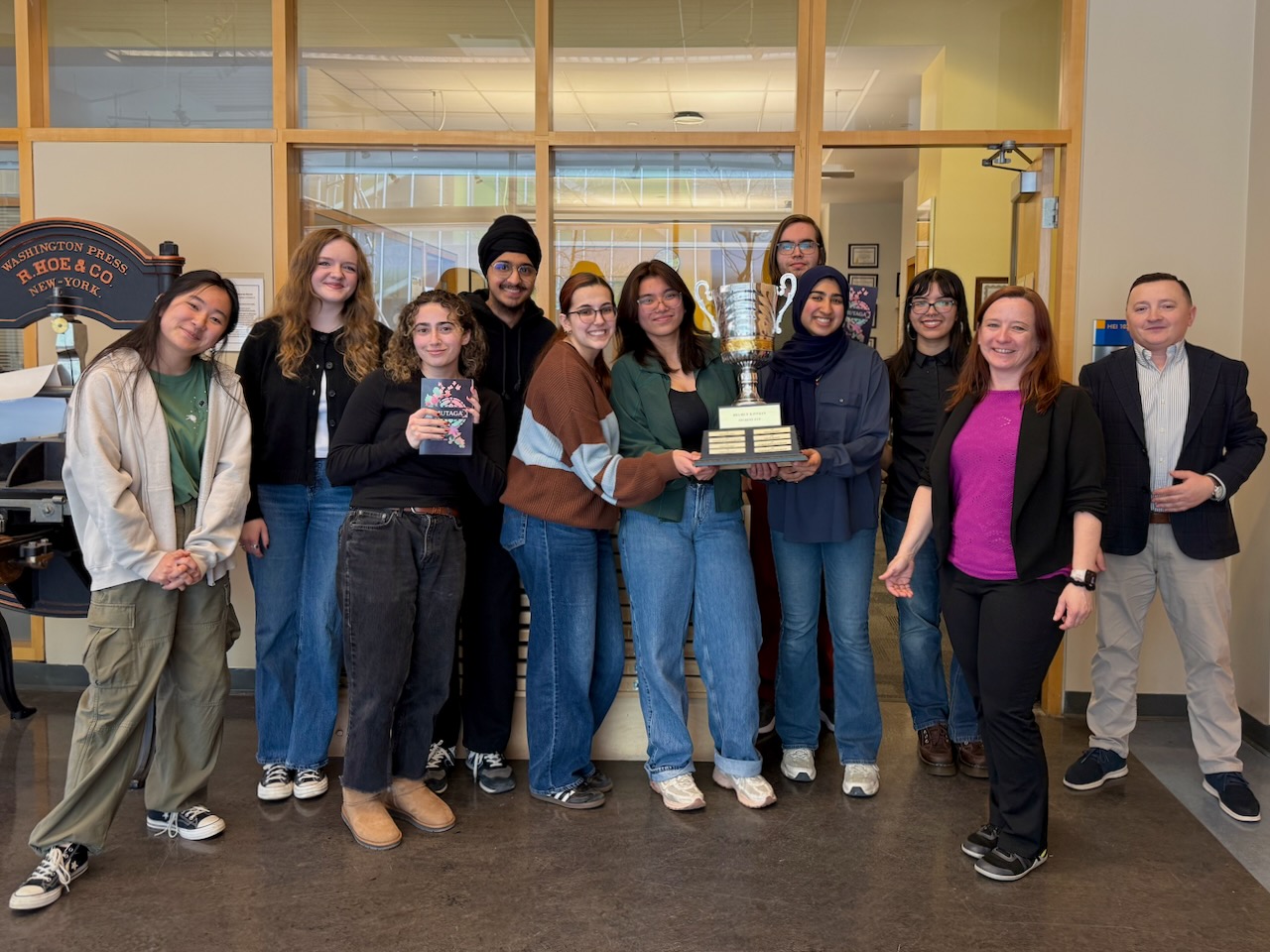TMUTAGA student group photos with trophy