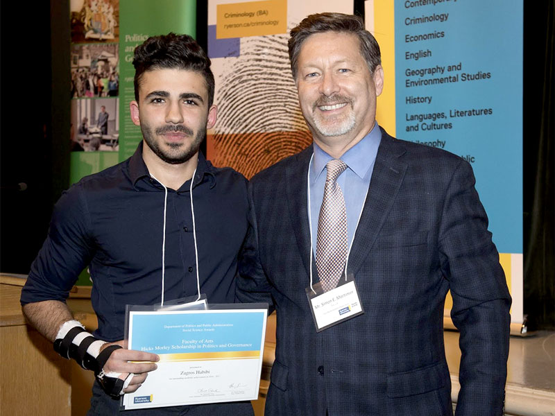hird-year Politics and Governance student, Zagros Habibi poses for photo with Hicks Morley partner Simon Mortimer at the Faculty of Arts Student Awards Ceremony on November 2, 2017.