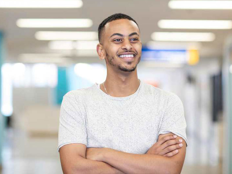 Nathan Anania Emmanuel, pictured at the Ted Rogers School of Management, credits the Marwah Family Award for First-Generation Students for helping him succeed at Ryerson. Photo: Alia Youssef