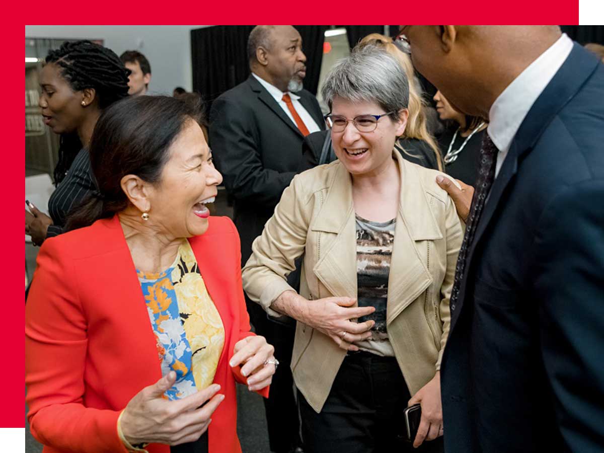 Donette Chin-Loy Chang shares a laugh with Lisa Barnoff.