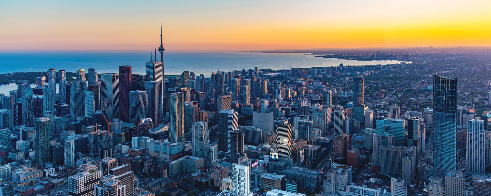 An aerial view of downtown Toronto and Lake Ontario.