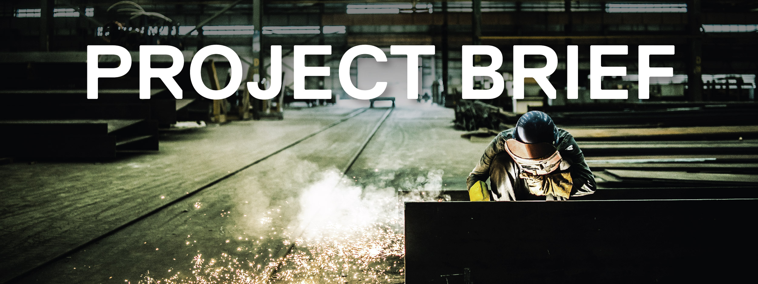 Welder welding in a warehouse