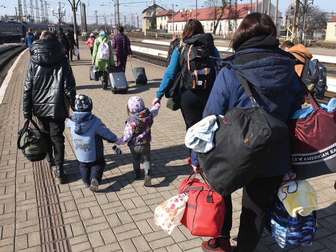 Evacuated walk along a platform in railway station of Lviv