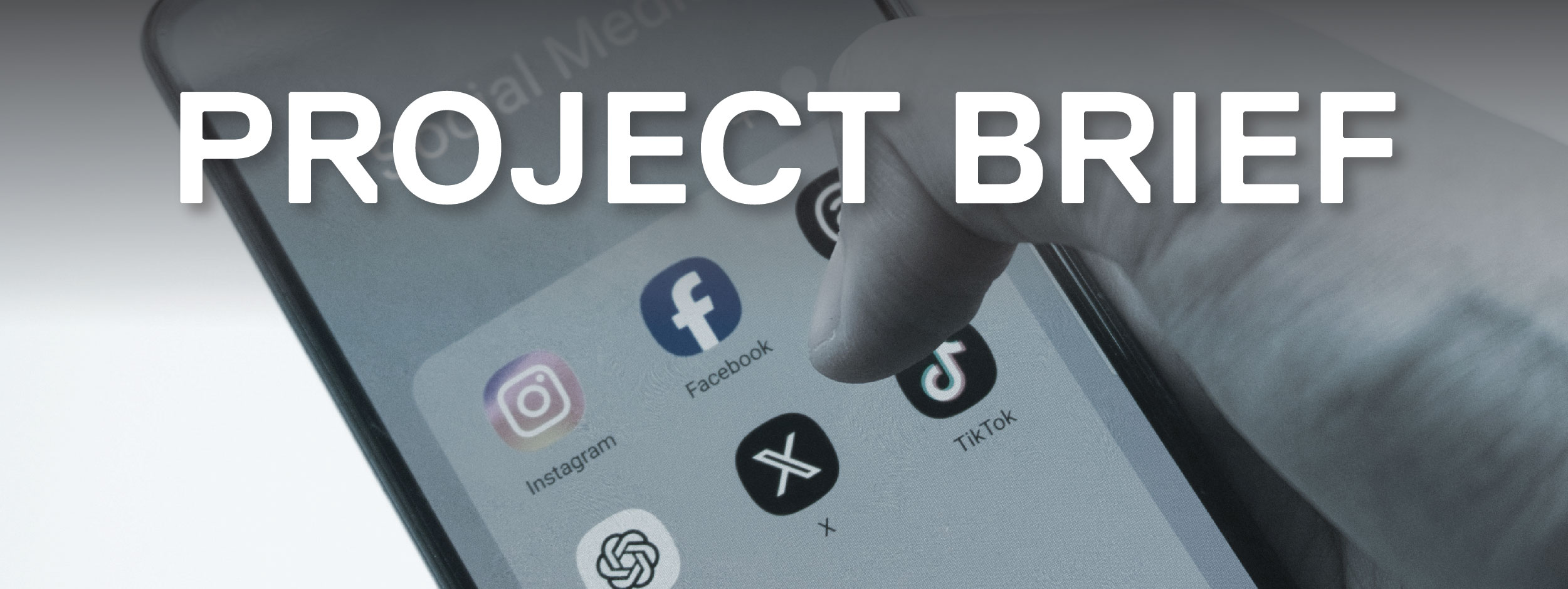 Person holding a cell phone with social media applications on the screen