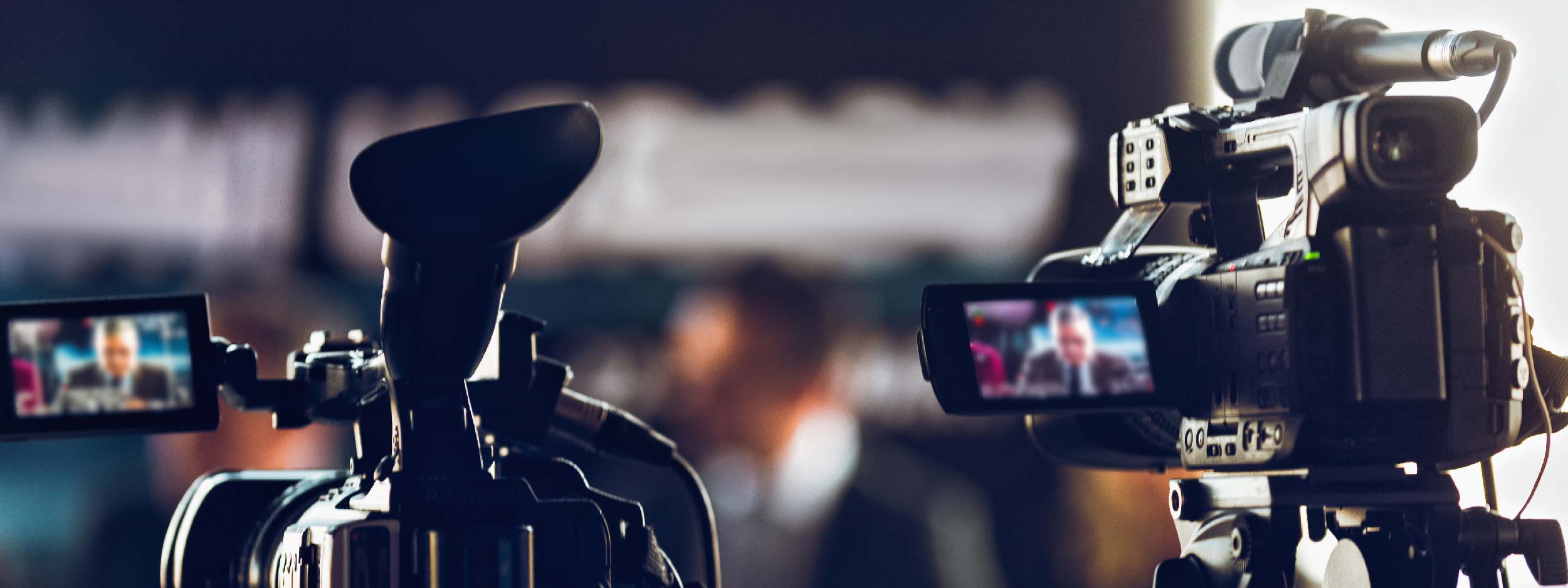Cameras at a press conference