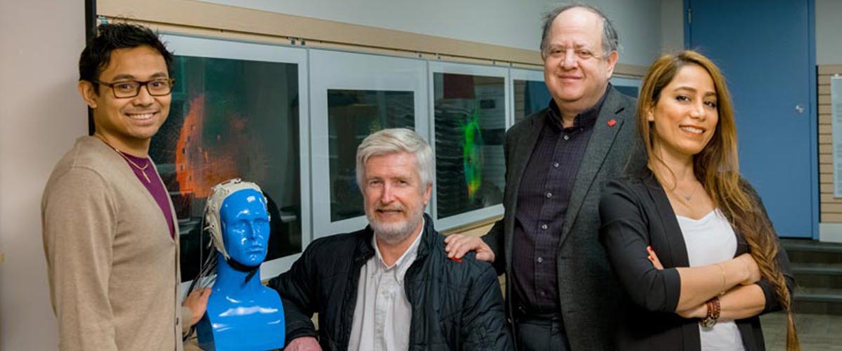 TMU master’s of engineering innovation and entrepreneurship graduate Wes Leewis (centre, left), is CEO of Headache Sciences Inc., with CTO Mario Garingo, president Mark Doidge, and software specialist Shiva Abdihagh. Photo by Clifton Li.