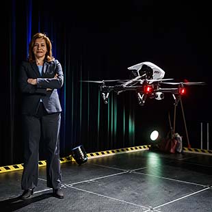 Graduate student with drone at the Ontario Science Centre 