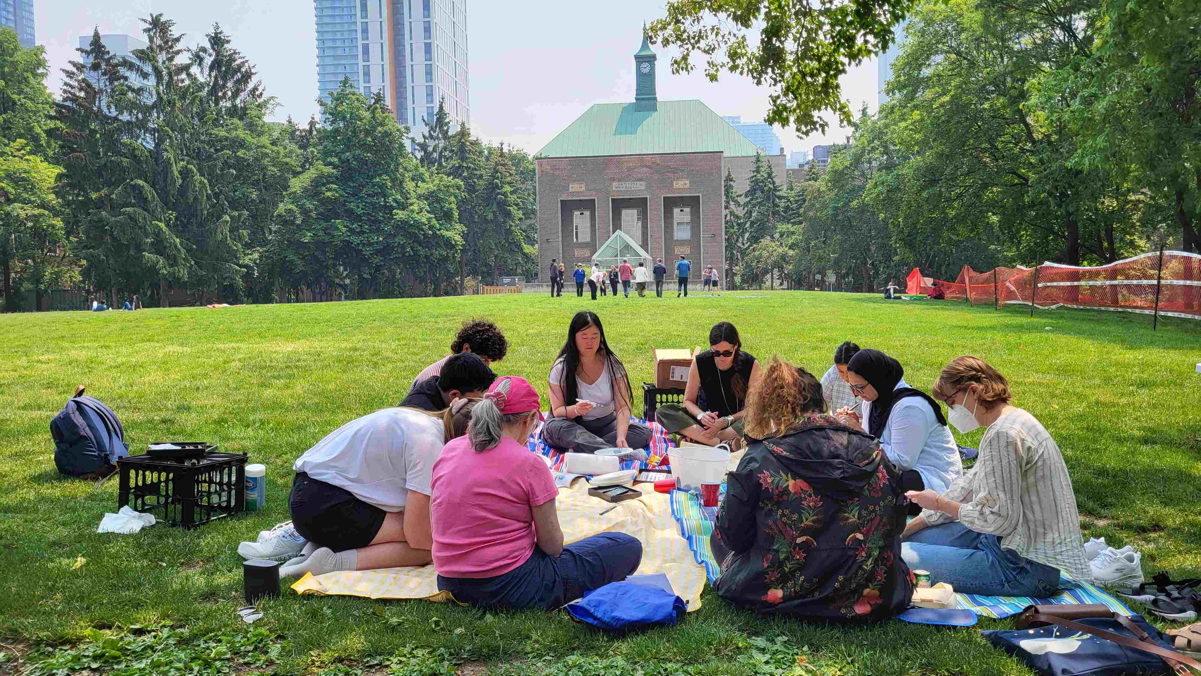 Participants paint rocks in Kerr Hall quad at the first GRAD Art Break.